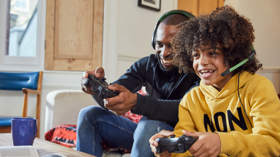 Family playing on gaming device