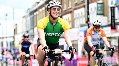 A man riding in a cycle race