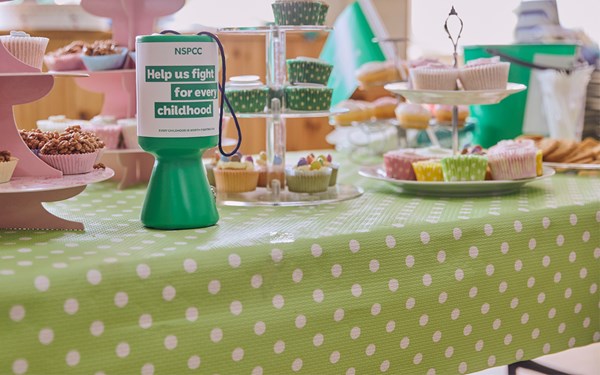 A table full of cakes for a bake sale